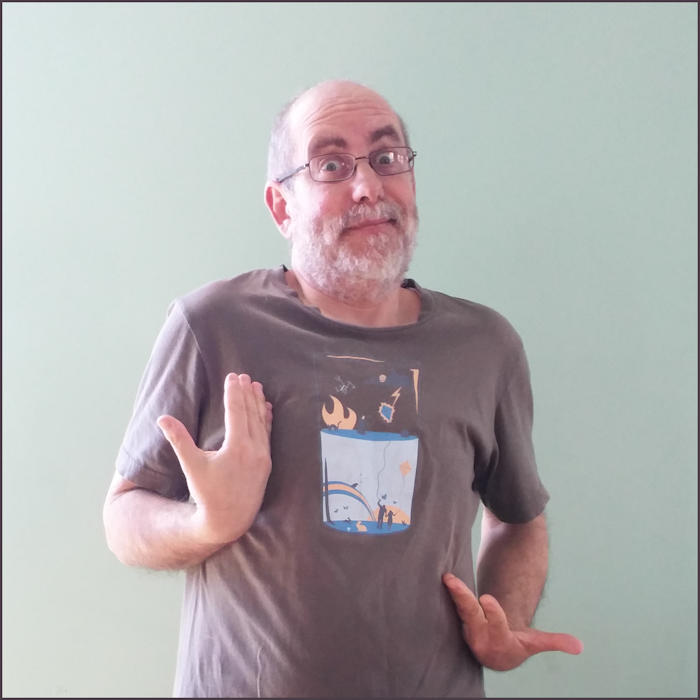 Bible Teacher Alan Gilman with his half-full/half-empty t-shirt